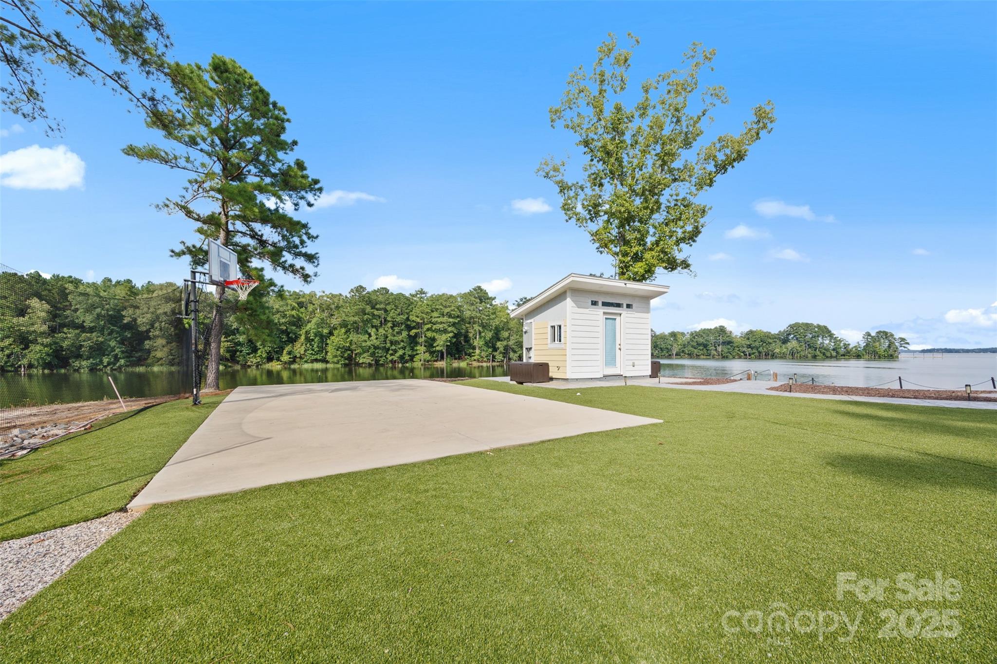 1075 Retreat Way Ridgeway, SC 29130 - Photo 43 of 48 a view of a house with a yard and garage