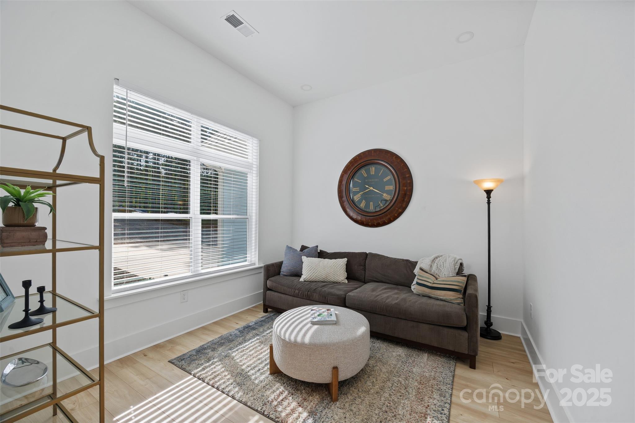 1075 Retreat Way Ridgeway, SC 29130 - Photo 8 of 48 a living room with furniture and a large window