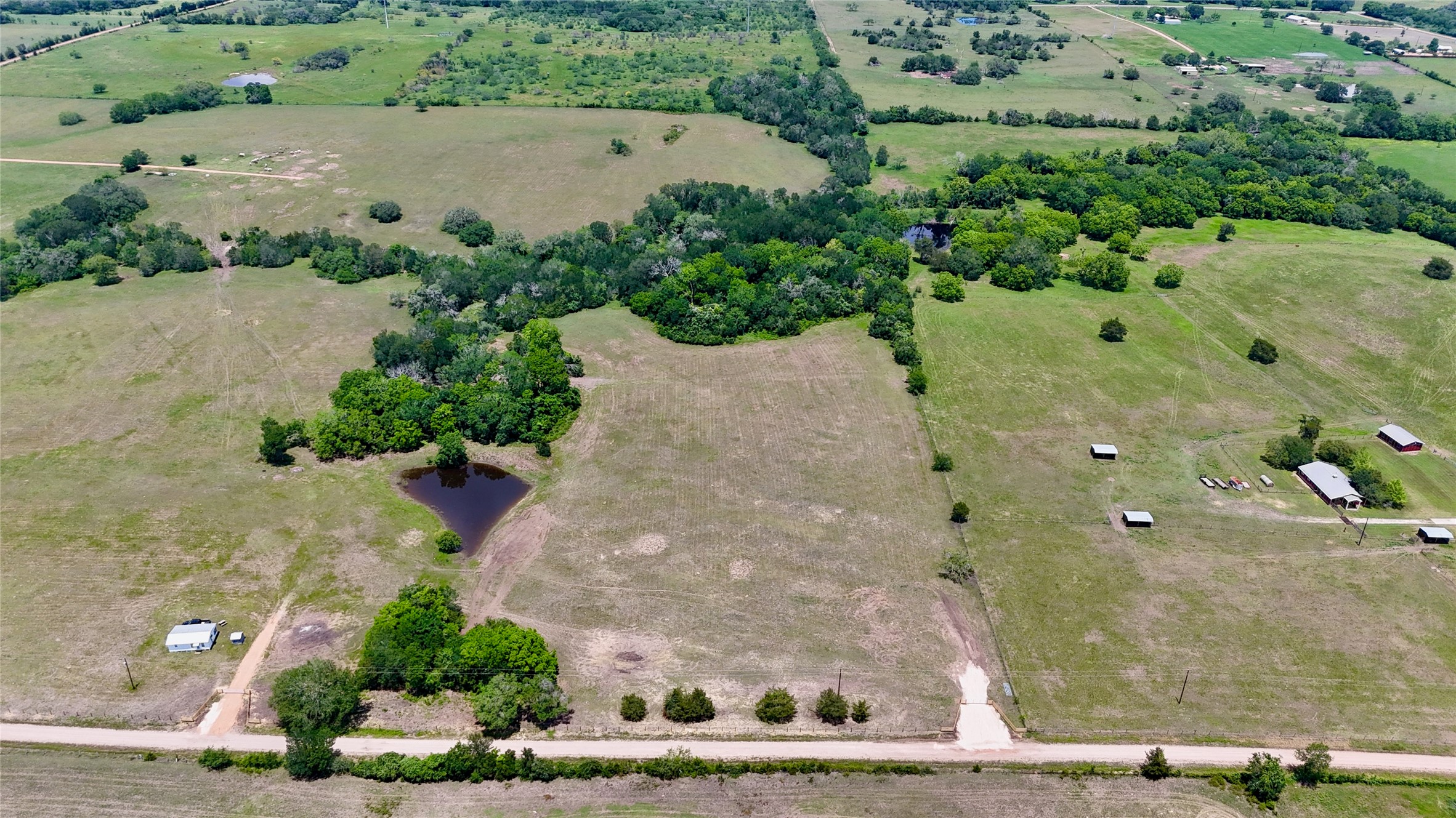 1049 Muehr Road Weimar, TX 78962 - Photo 7 of 24 an aerial view of a residential houses with outdoor space