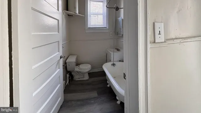 a bathroom with a sink and toilet