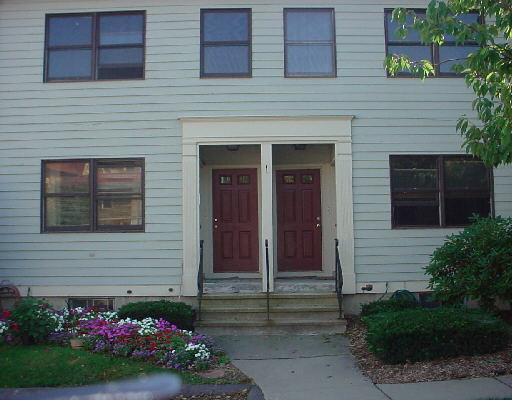 65 Ellsworth Street, Unit 313 Bridgeport, CT 06605 - Photo 1 of 1 a house with a garden