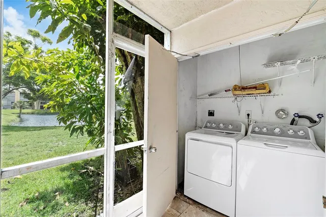 a utility room with dryer and washer