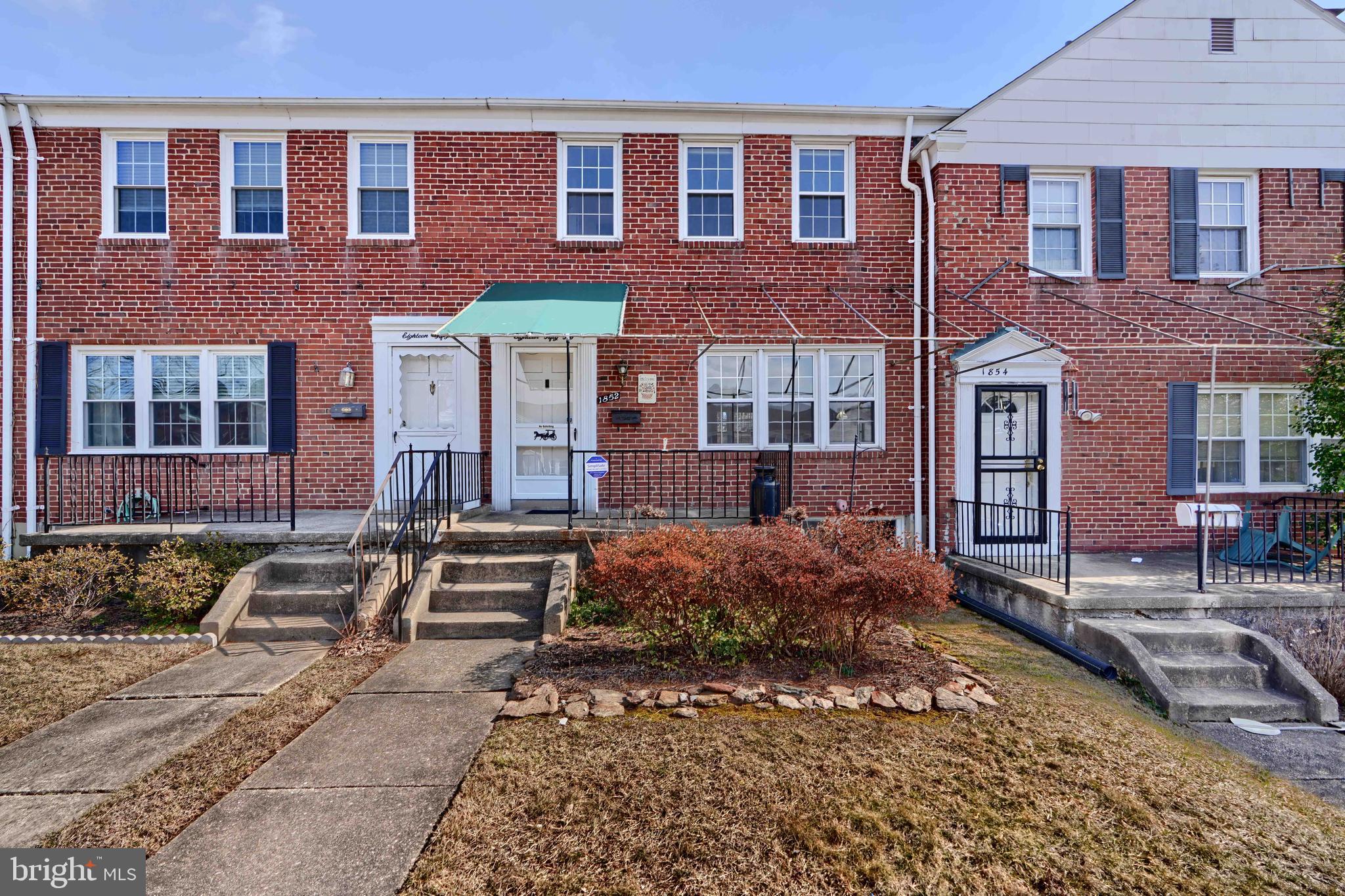 1852 Edgewood Road Towson, MD 21286 - Photo 1 of 31 a front view of a house with garden