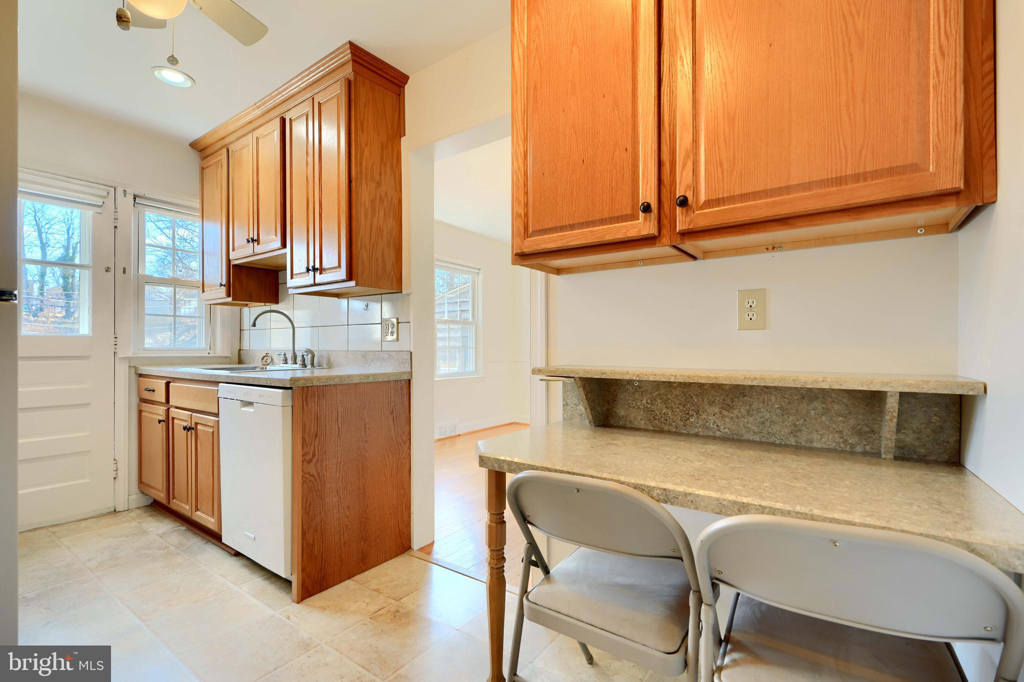 1852 Edgewood Road Towson, MD 21286 - Photo 11 of 31 a kitchen with stainless steel appliances granite countertop a sink and a cabinets