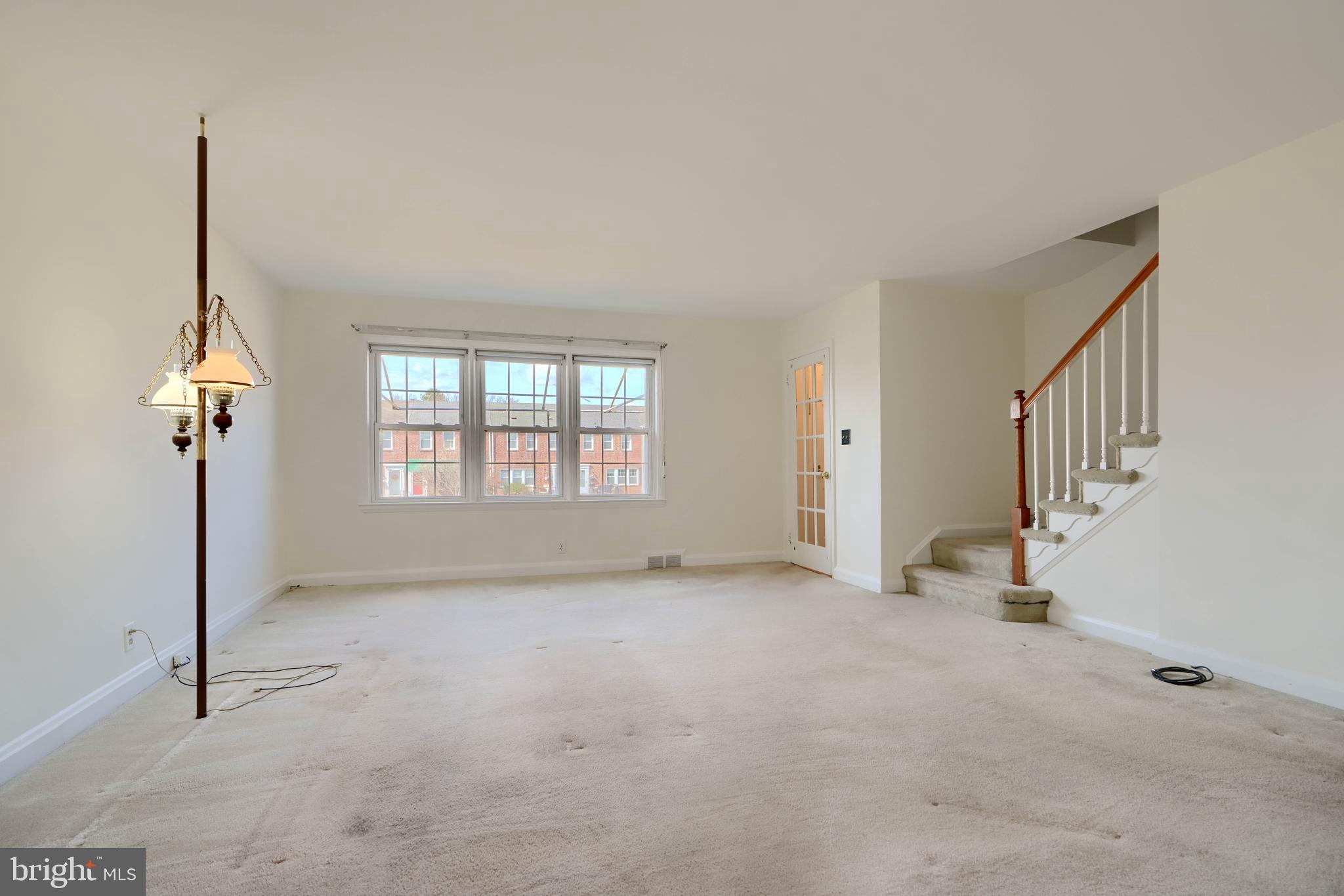 1852 Edgewood Road Towson, MD 21286 - Photo 5 of 31 a view of an empty room with a window