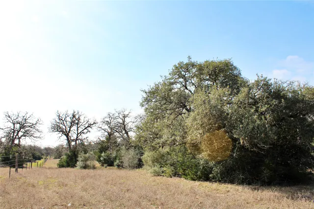 a view of a covered with snow in front of yard