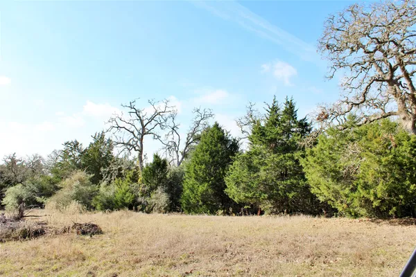 a view of a snow covered with snow in the background