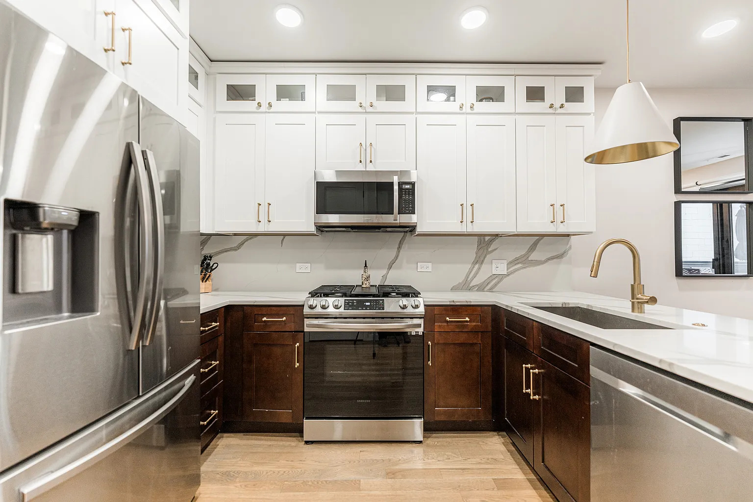 1703 West Chicago Avenue, Unit 4 Chicago, IL 60622 - Photo 6 of 11 a kitchen with stainless steel appliances granite countertop a stove and a refrigerator
