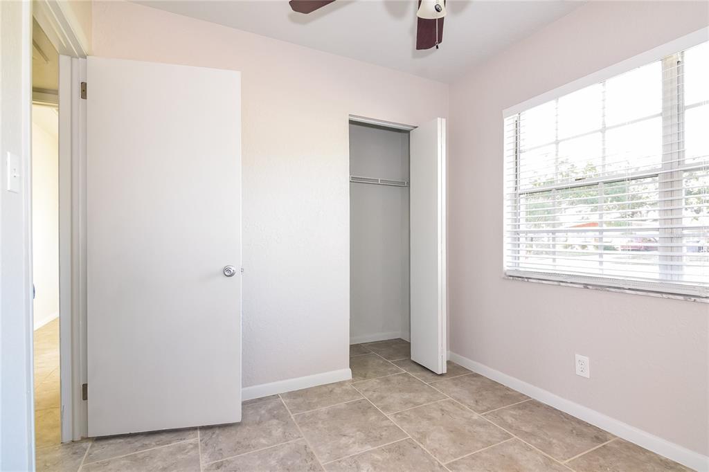 3610 West Leila Avenue Tampa, FL 33611 - Photo 11 of 15 a view of an empty room with a window