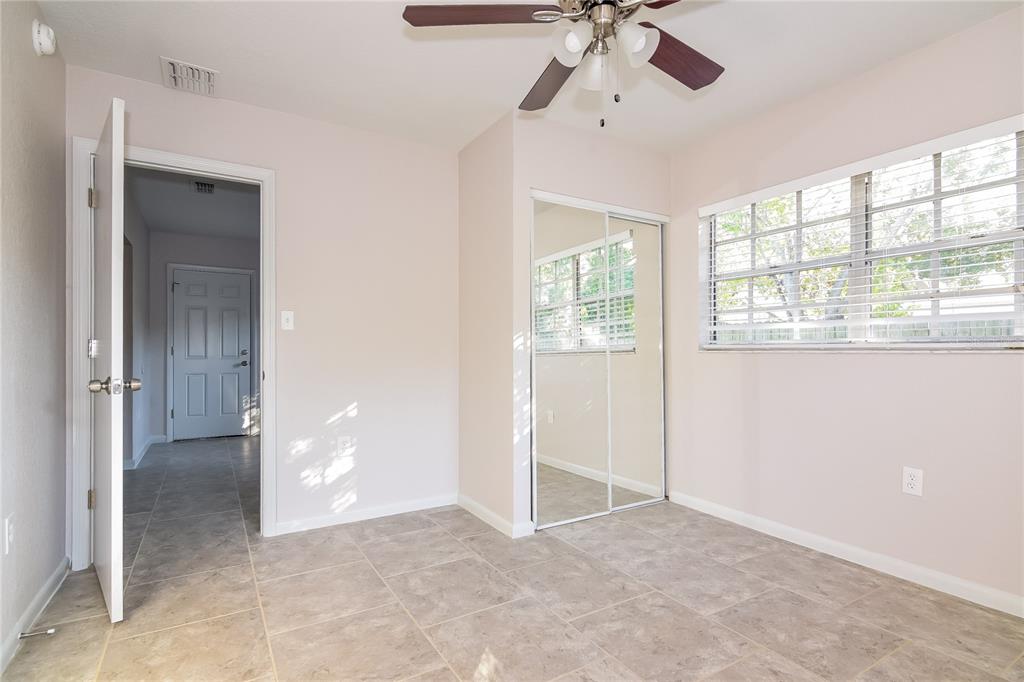 3610 West Leila Avenue Tampa, FL 33611 - Photo 10 of 15 a view of an empty room with a window