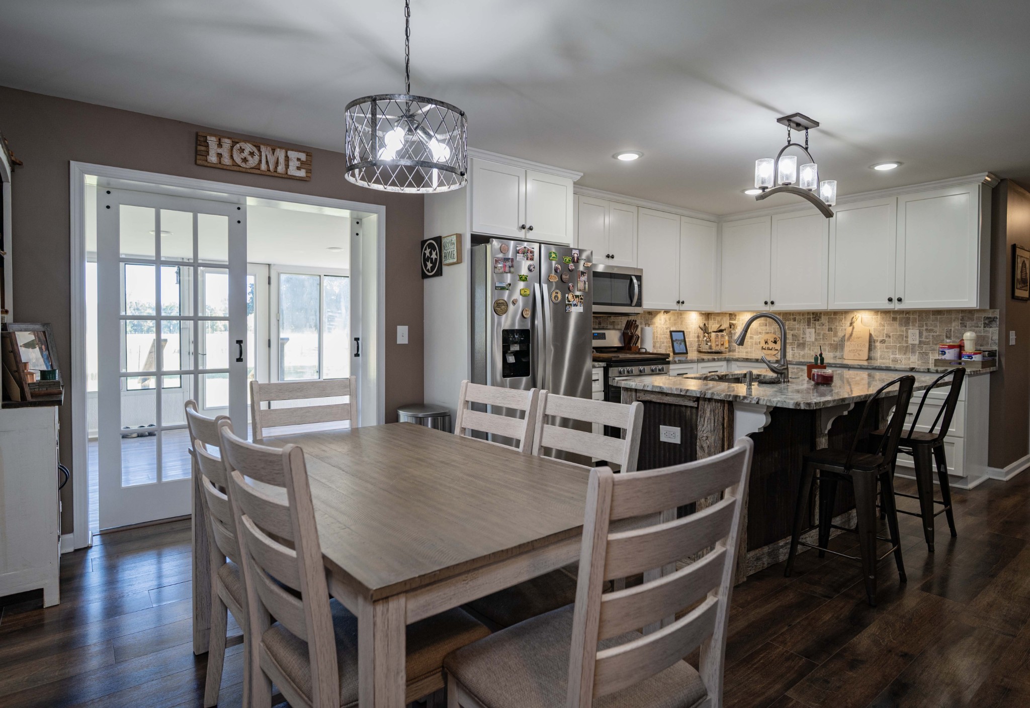 49 Bush Road Bradyville, TN 37026 - Photo 14 of 38 a view of a dining room with furniture window and wooden floor