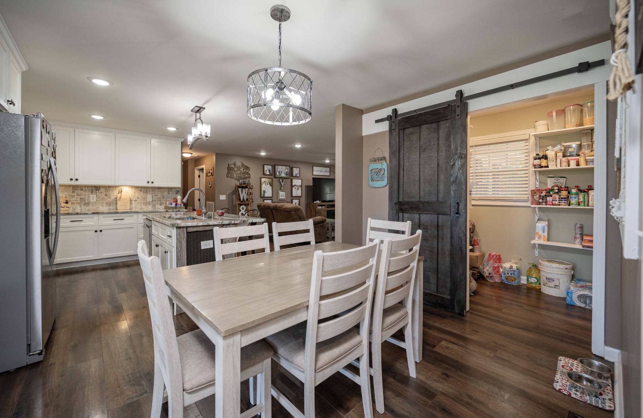 49 Bush Road Bradyville, TN 37026 - Photo 16 of 38 a view of a dining room with furniture window and wooden floor