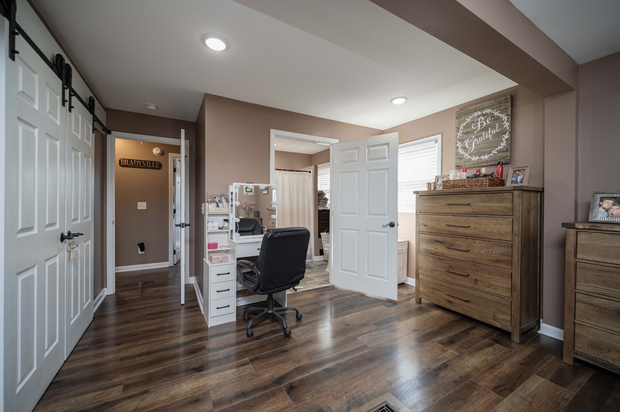 49 Bush Road Bradyville, TN 37026 - Photo 21 of 38 a view of a hallway with workspace and wooden floor