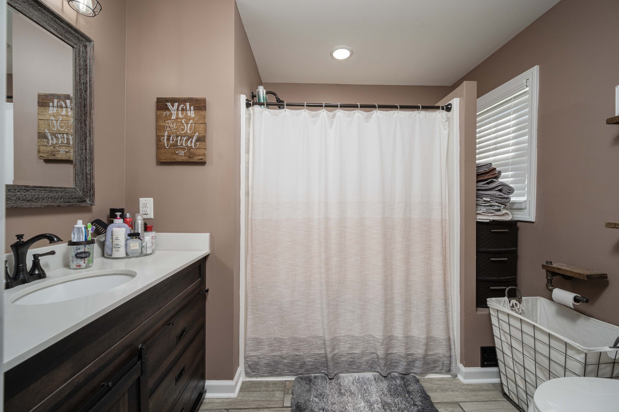 49 Bush Road Bradyville, TN 37026 - Photo 24 of 38 a bathroom with a sink and a mirror