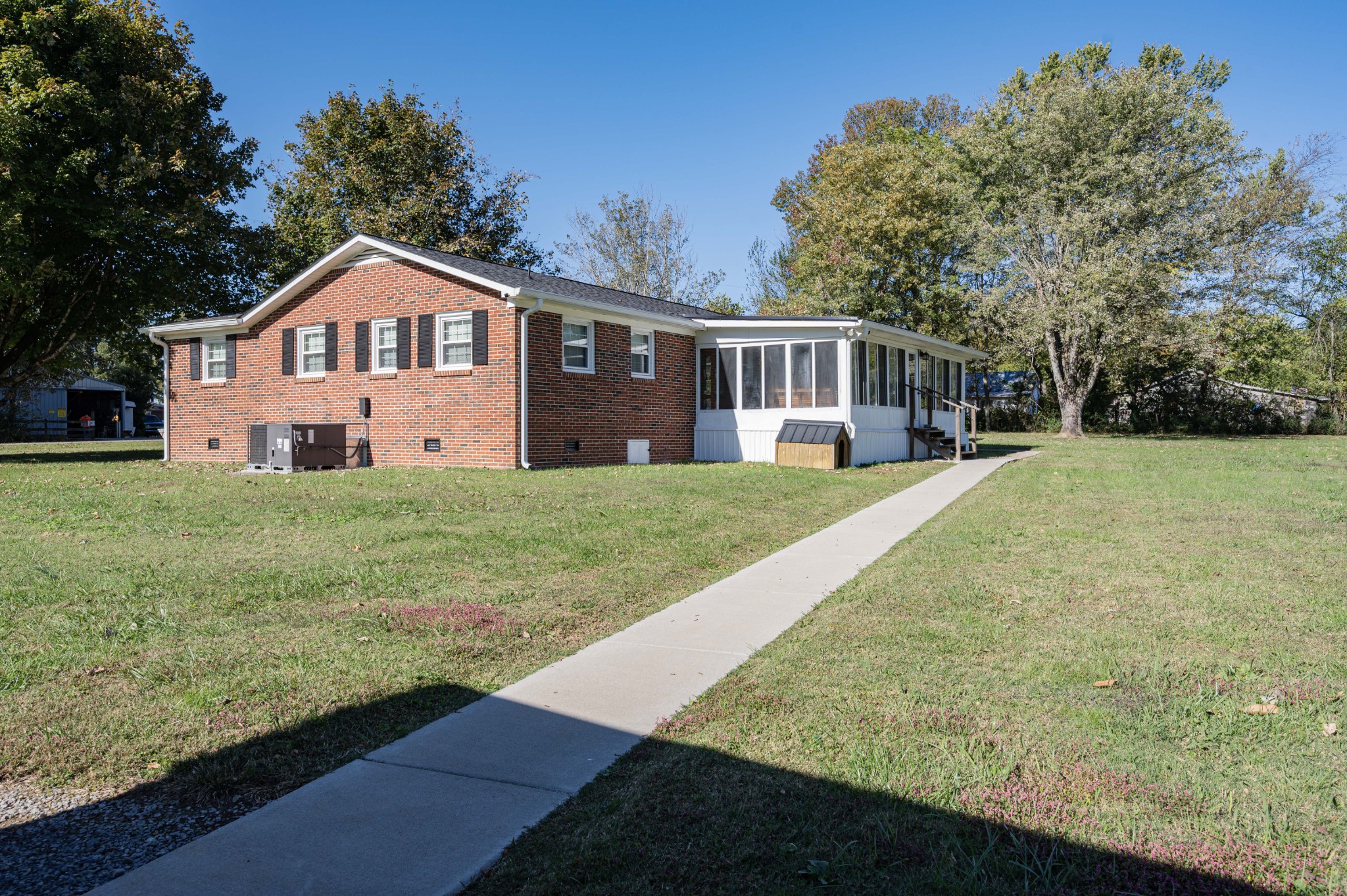 49 Bush Road Bradyville, TN 37026 - Photo 28 of 38 a front view of a house with yard and green space