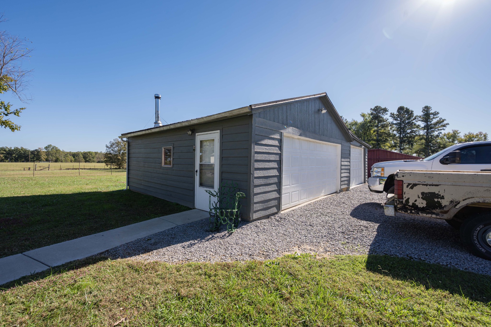 49 Bush Road Bradyville, TN 37026 - Photo 29 of 38 a front view of a house with garden