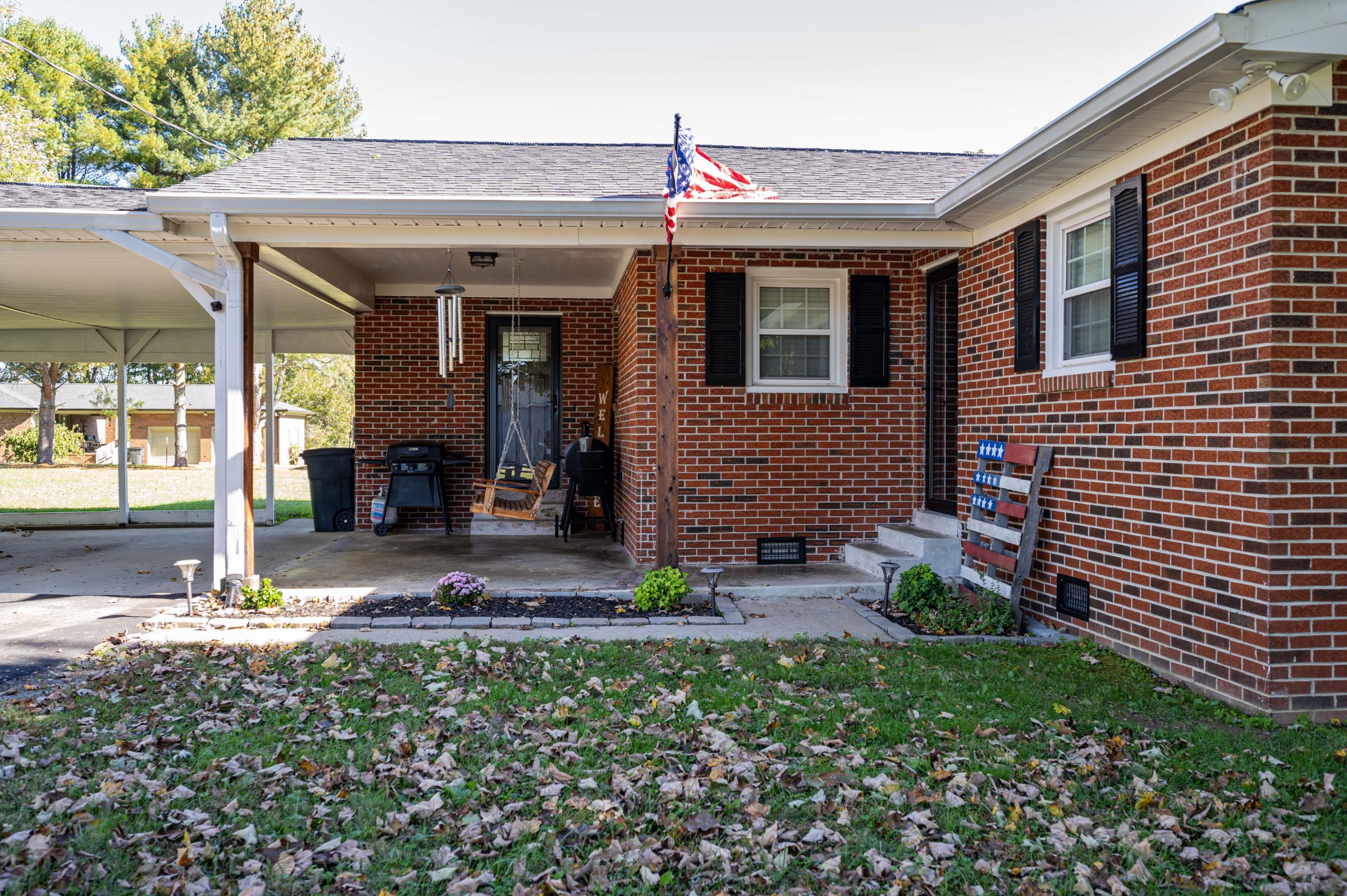 49 Bush Road Bradyville, TN 37026 - Photo 3 of 38 a front view of a house with garden