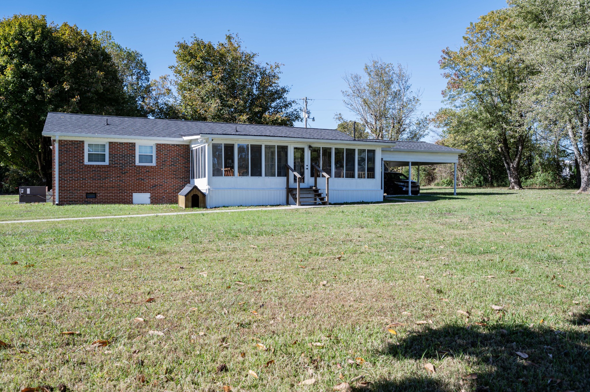 49 Bush Road Bradyville, TN 37026 - Photo 36 of 38 a view of a yard in front of a house with large tree