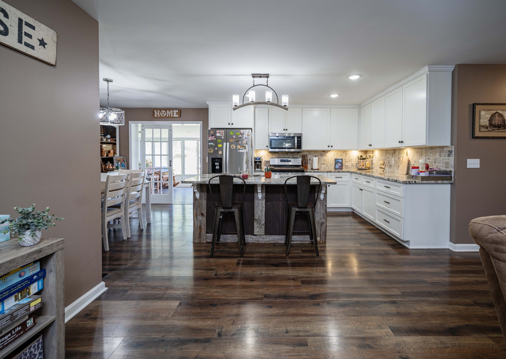 49 Bush Road Bradyville, TN 37026 - Photo 8 of 38 a view of a dining room with furniture and wooden floor