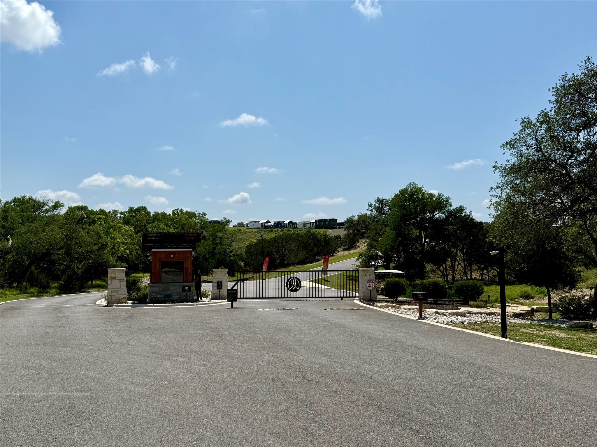 5386 Ranch Road 1376, Unit 210 Fredericksburg, TX 78624 - Photo 13 of 13 a view of a street with houses