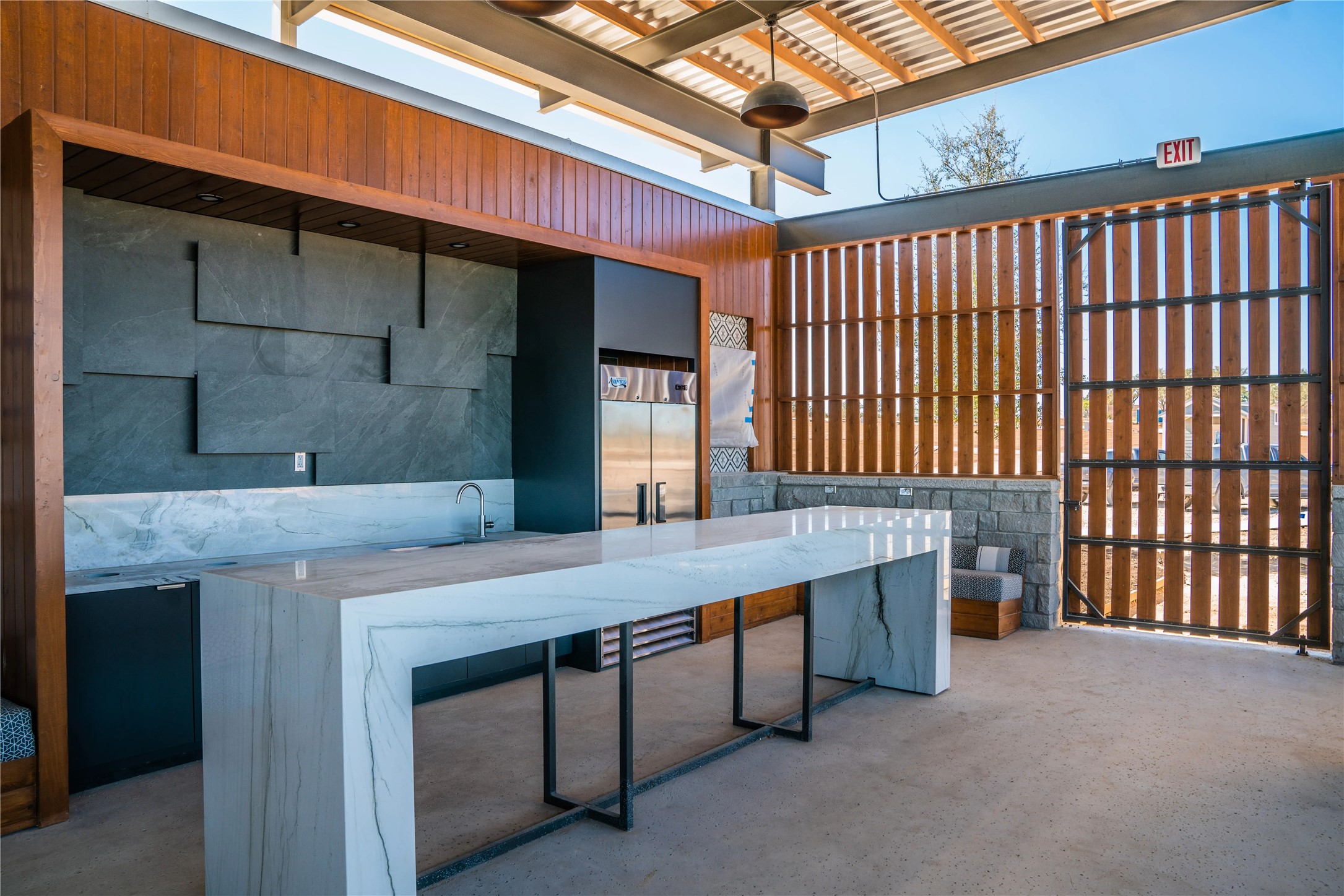 5386 Ranch Road 1376, Unit 210 Fredericksburg, TX 78624 - Photo 9 of 13 a kitchen with a table and chairs