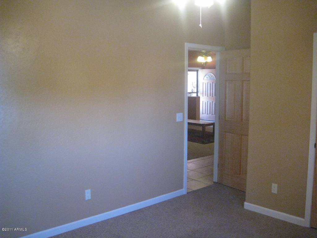 3130 South Olmo Road Maricopa, AZ 85139 - Photo 13 of 34 2nd Bdrm toward dr