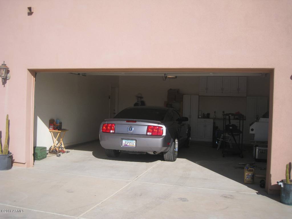 3130 South Olmo Road Maricopa, AZ 85139 - Photo 18 of 34 Full garage with cabinets