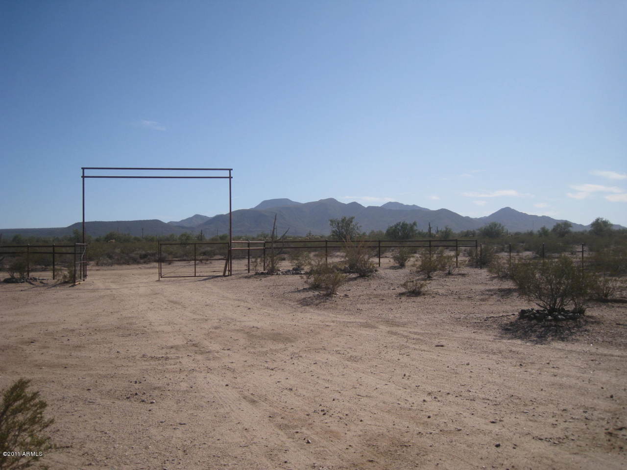 3130 South Olmo Road Maricopa, AZ 85139 - Photo 20 of 34 Fenced Front Entrance to Property