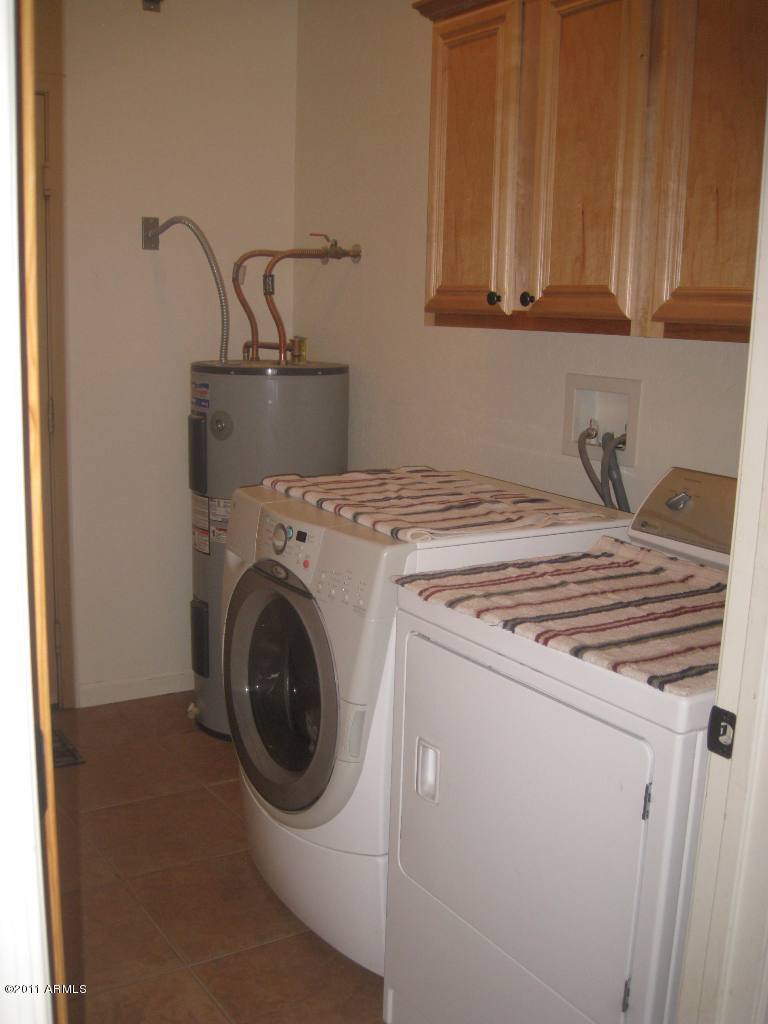 3130 South Olmo Road Maricopa, AZ 85139 - Photo 24 of 34 Laundry Rm with Cabinets