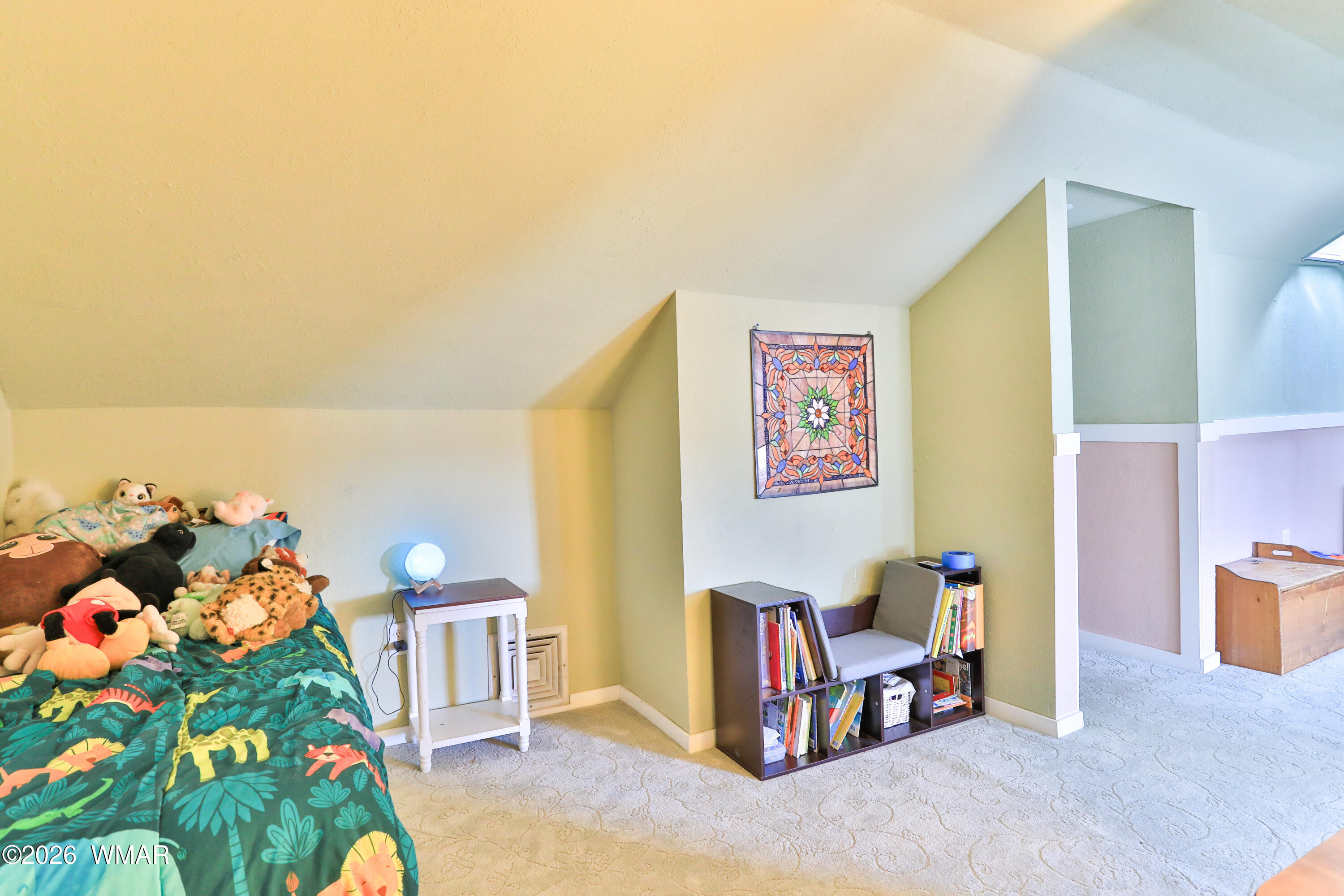 102 Crestview Road Holbrook, AZ 86025 - Photo 36 of 55 a bedroom with furniture and a baby crib