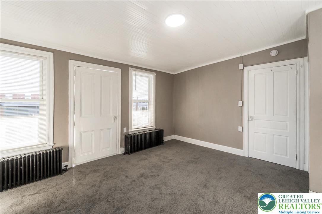 2213 Village Road Orefield, PA 18069 - Photo 11 of 41 a view of an empty room with a window
