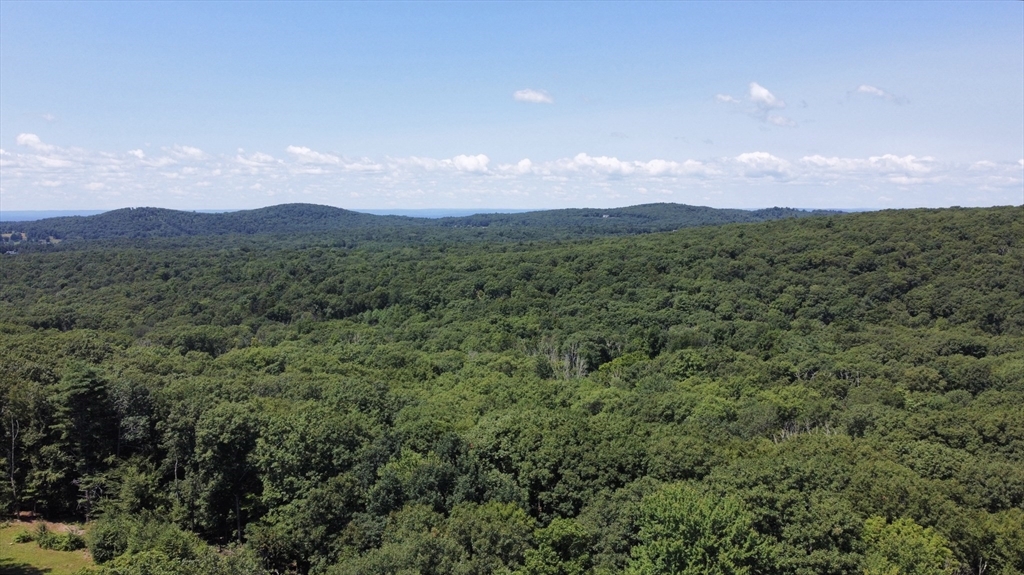 Lot 6 Upper Hampden Road Monson, MA 01057 - Photo 14 of 14 a view of a city with lush green forest