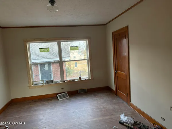an empty room with a window