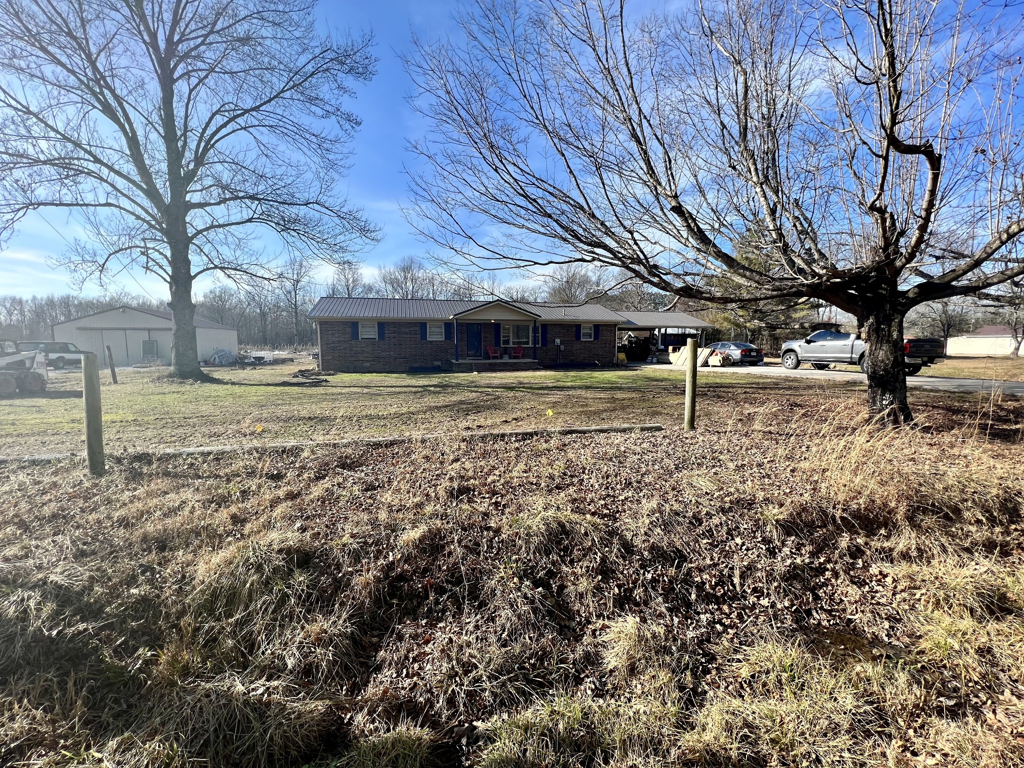 132 Pratt Road Manchester, TN 37355 - Photo 2 of 50 a view of a yard with plants and trees