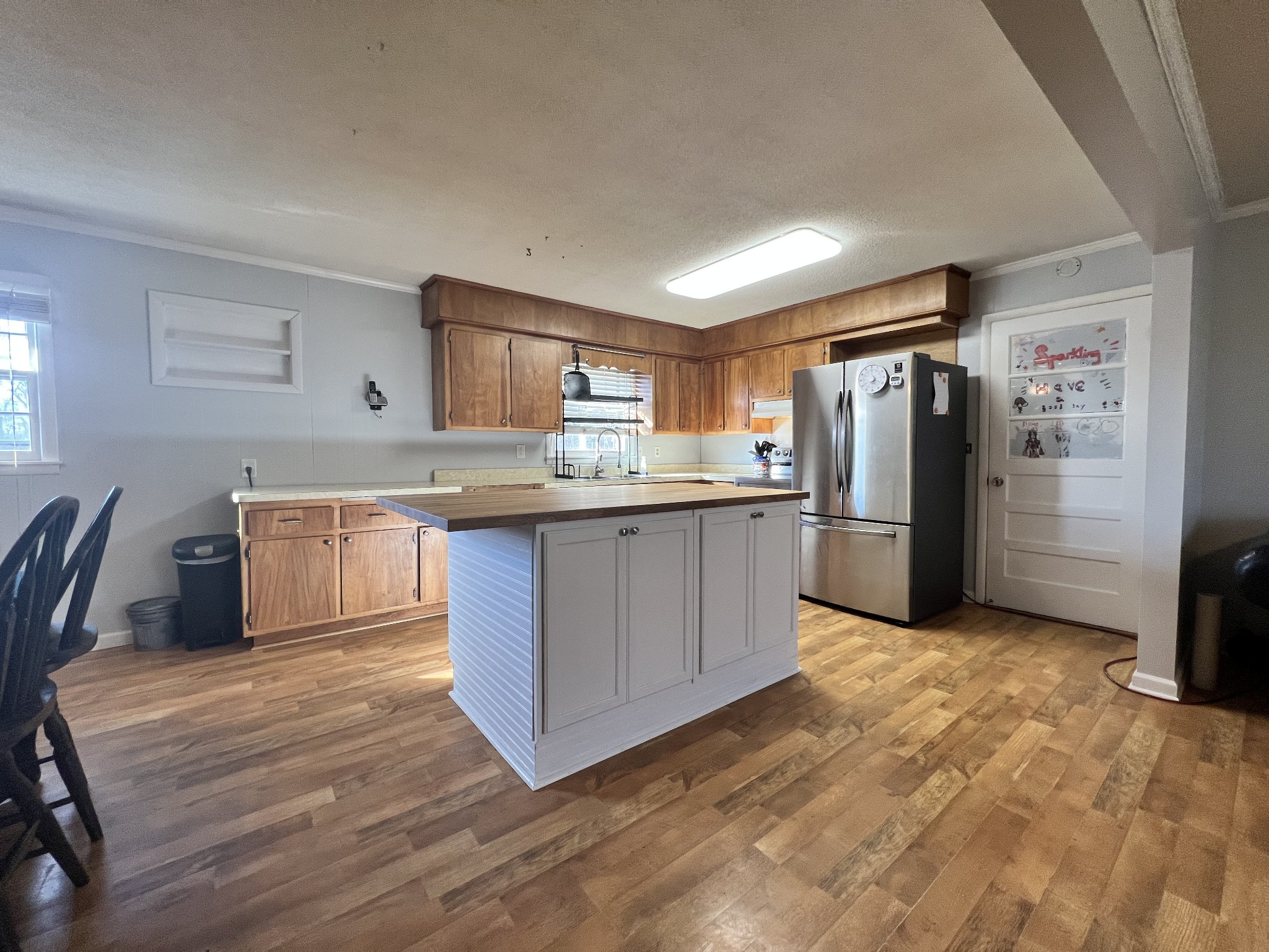 132 Pratt Road Manchester, TN 37355 - Photo 6 of 50 a kitchen with stainless steel appliances granite countertop a refrigerator a stove a sink dishwasher and a refrigerator
