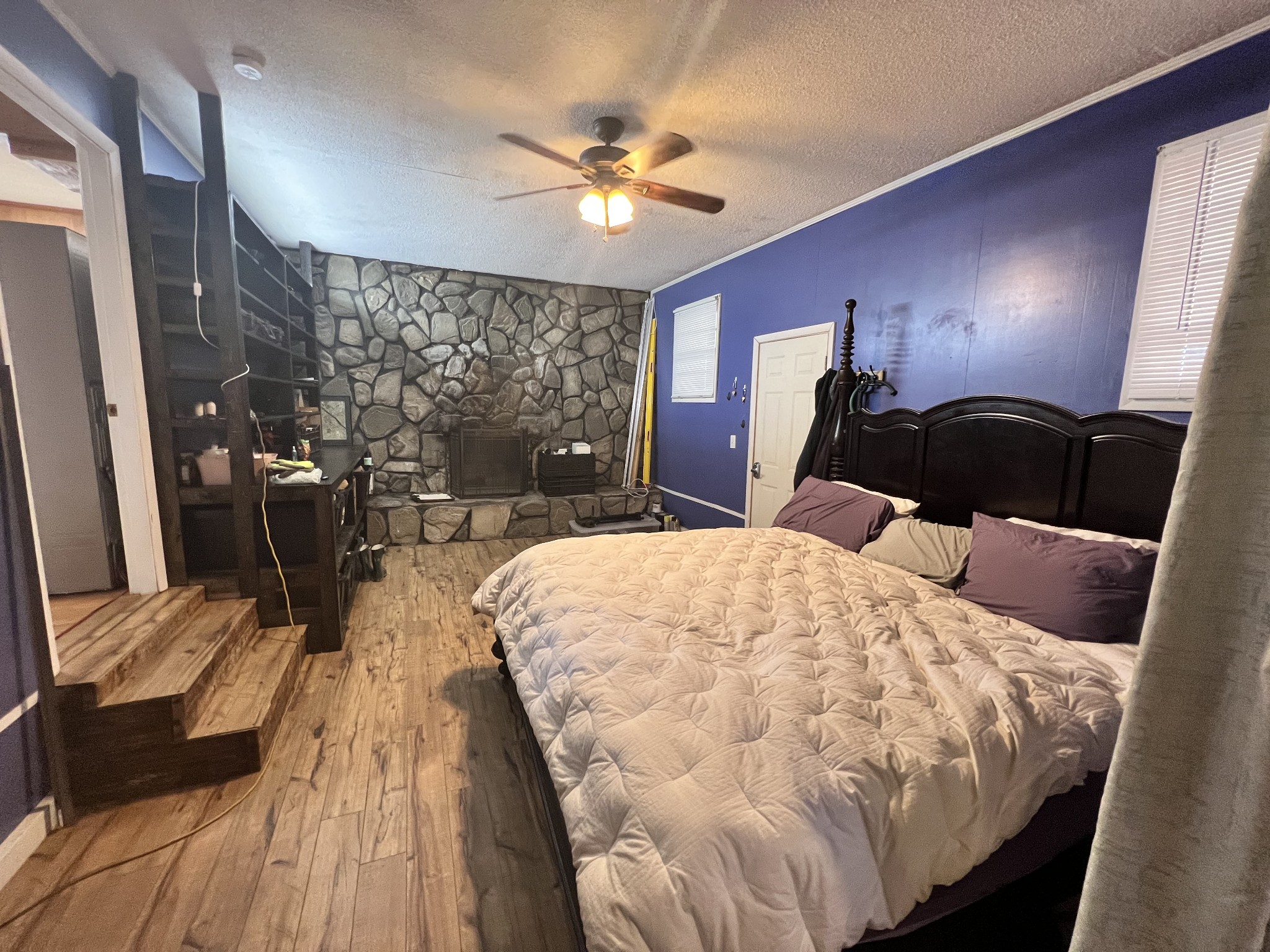 132 Pratt Road Manchester, TN 37355 - Photo 9 of 50 a bed room with a bed window and a chandelier