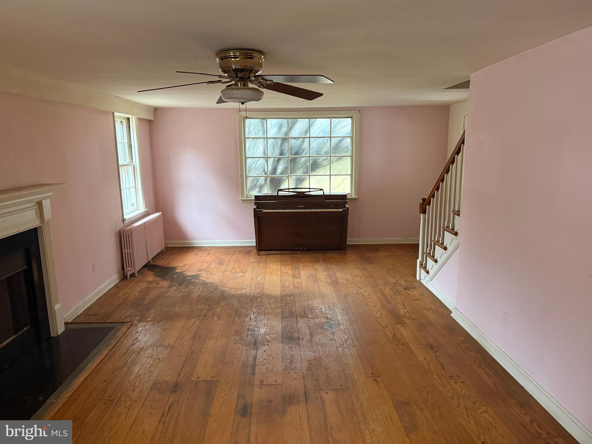 8026 Rider Avenue Towson, MD 21204 - Photo 16 of 29 a view of an empty room with wooden floor and a window