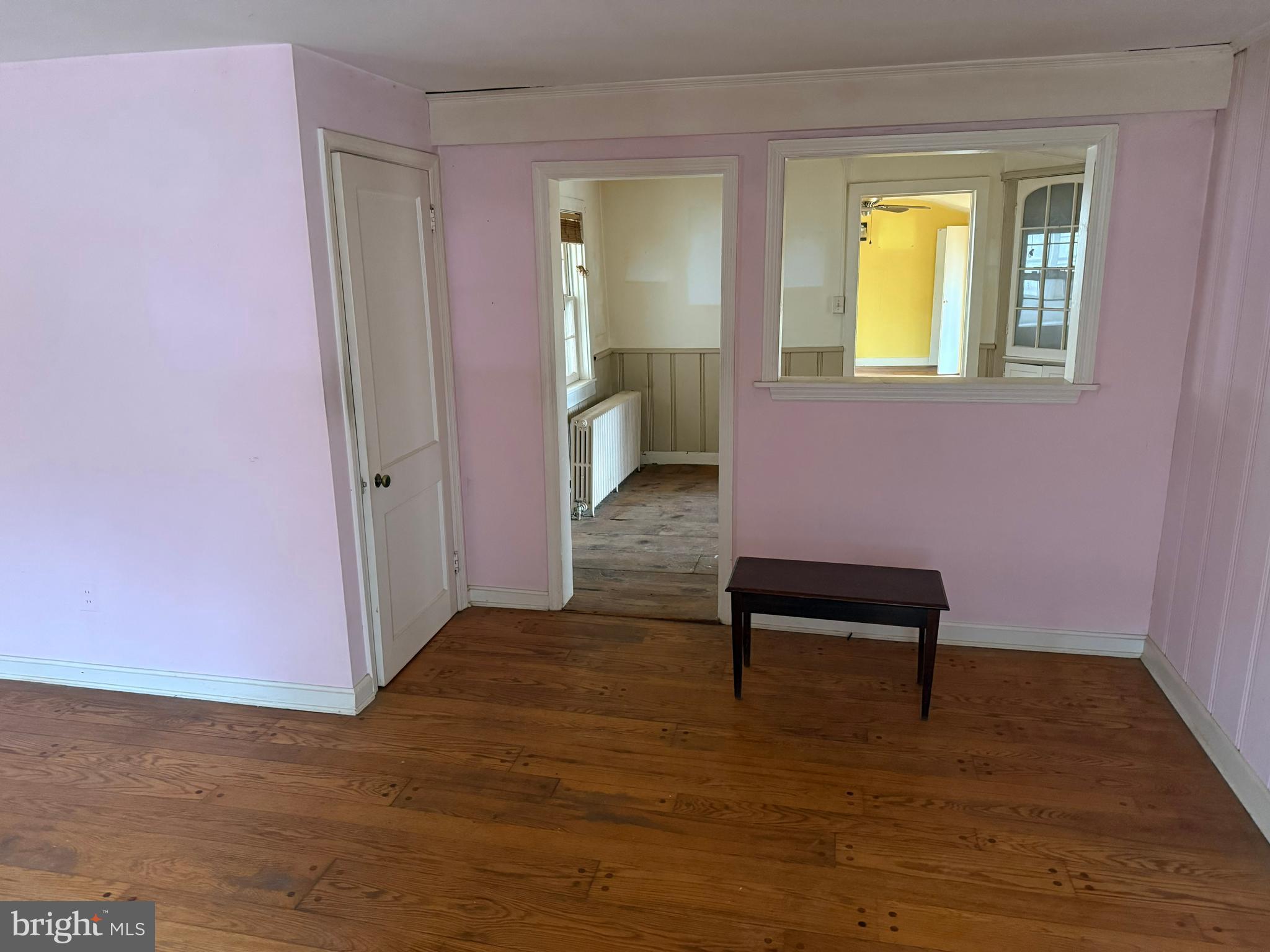 8026 Rider Avenue Towson, MD 21204 - Photo 17 of 29 a view of a room with wooden floor and a window