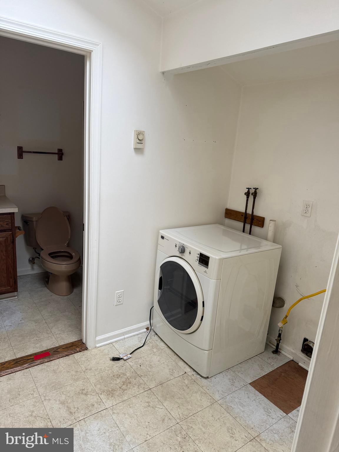 8026 Rider Avenue Towson, MD 21204 - Photo 7 of 29 a utility room with dryer and washer
