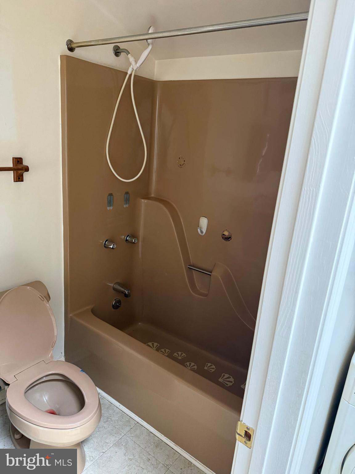 8026 Rider Avenue Towson, MD 21204 - Photo 8 of 29 a bathroom with a toilet and shower