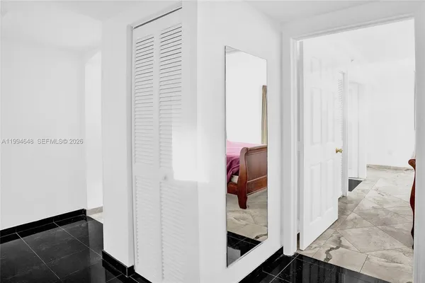 a view of a living room and a window