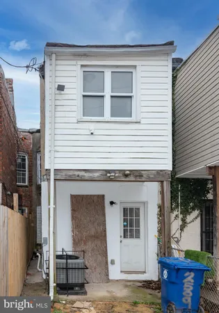 a view of a balcony with chairs