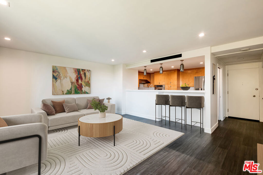 2160 Century Hill, Unit 803 Los Angeles, CA 90067 - Photo 3 of 17 a living room with furniture and a wooden floor