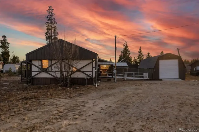 a view of outdoor space and backyard
