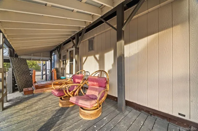 a backyard of a house with seating space
