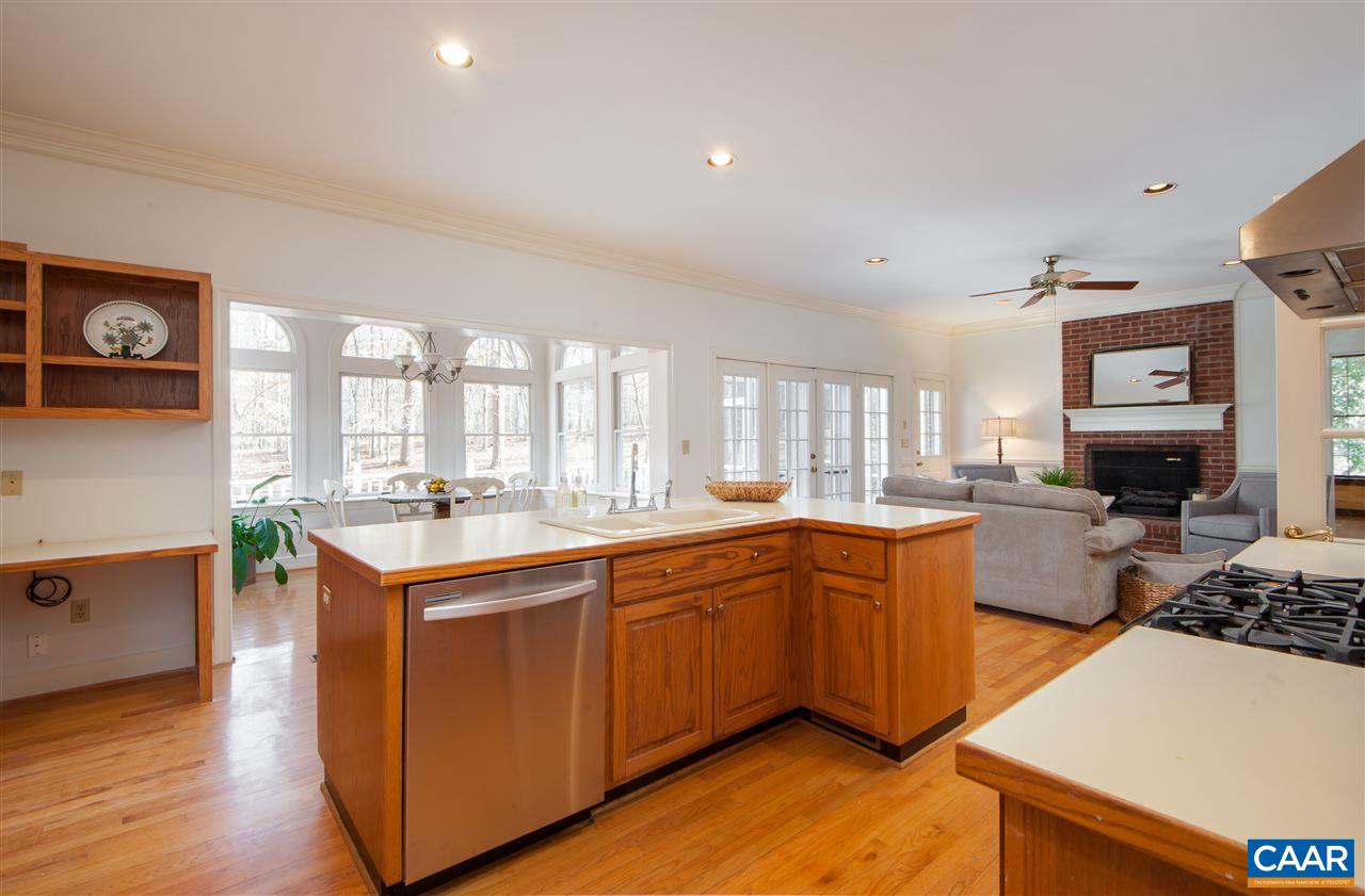 130 Terrell Road East Charlottesville, VA 22901 - Photo 11 of 44 a large kitchen with stainless steel appliances granite countertop a stove and a sink