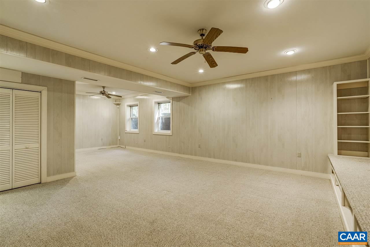 130 Terrell Road East Charlottesville, VA 22901 - Photo 33 of 44 an empty room with windows and fan