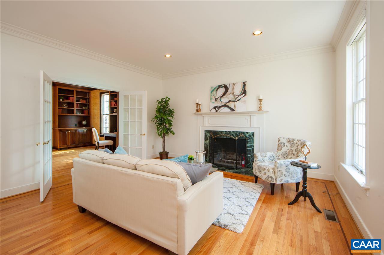 130 Terrell Road East Charlottesville, VA 22901 - Photo 8 of 44 a living room with furniture and a fireplace
