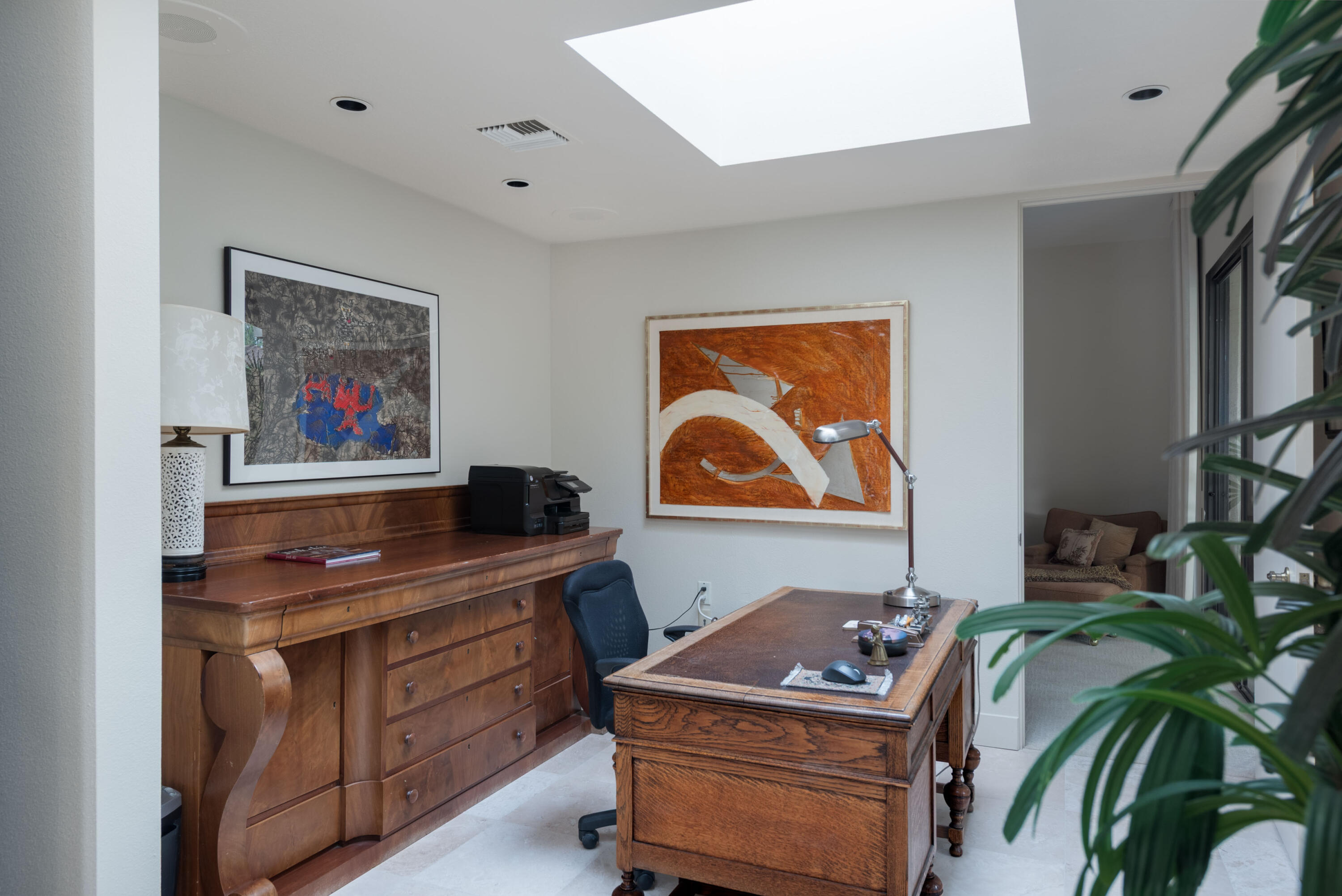 3 Cornell Drive Rancho Mirage, CA 92270 - Photo 14 of 46 a bedroom with a bed and a desk