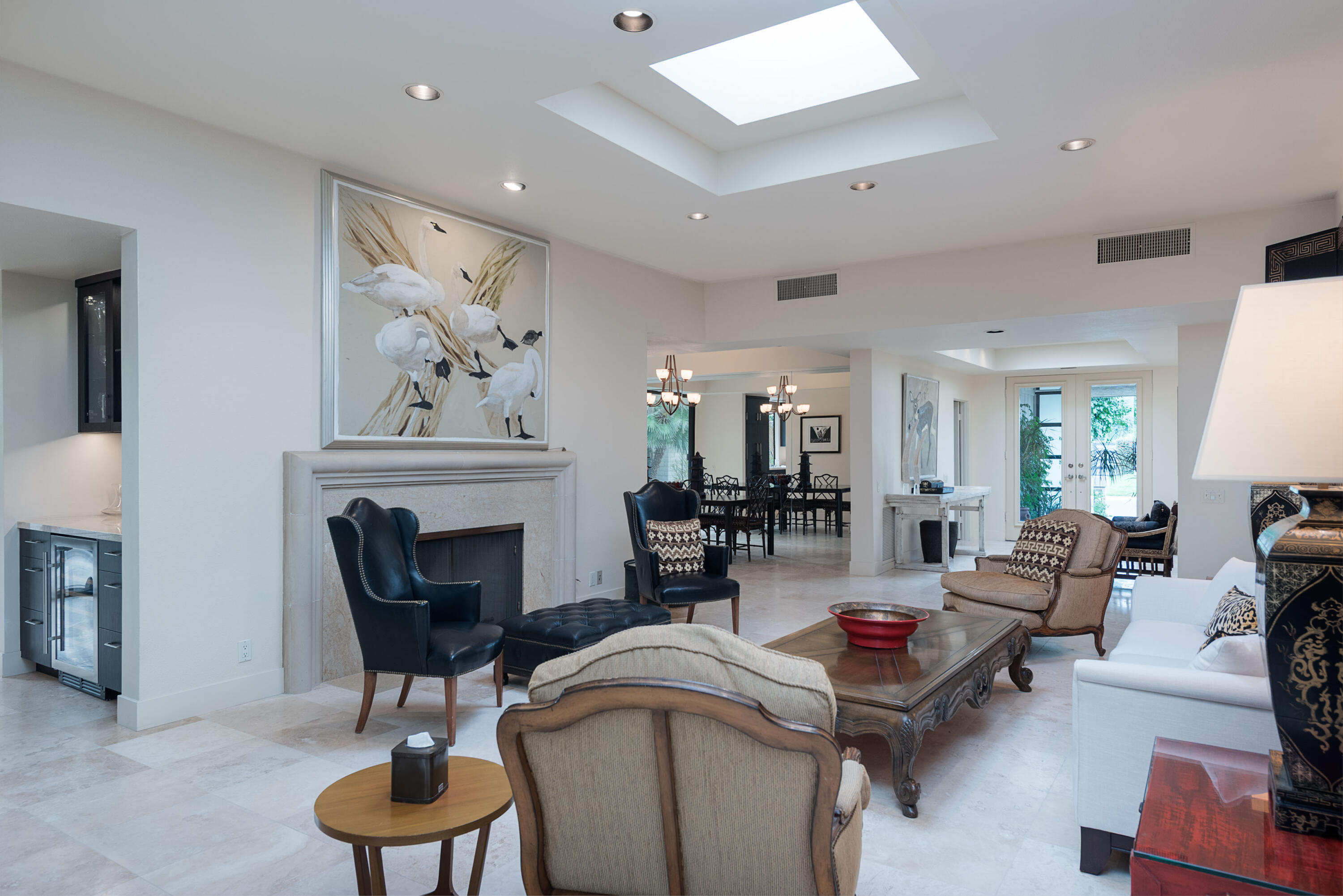 3 Cornell Drive Rancho Mirage, CA 92270 - Photo 15 of 46 a living room with furniture and a fireplace